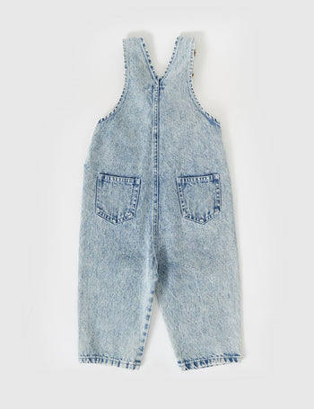 The Goldie + Ace Austin Vintage Washed Denim Overalls in Light Denim pictured on a grey background. The material is cotton denim. It is a overall made for babies, toddlers and kids.