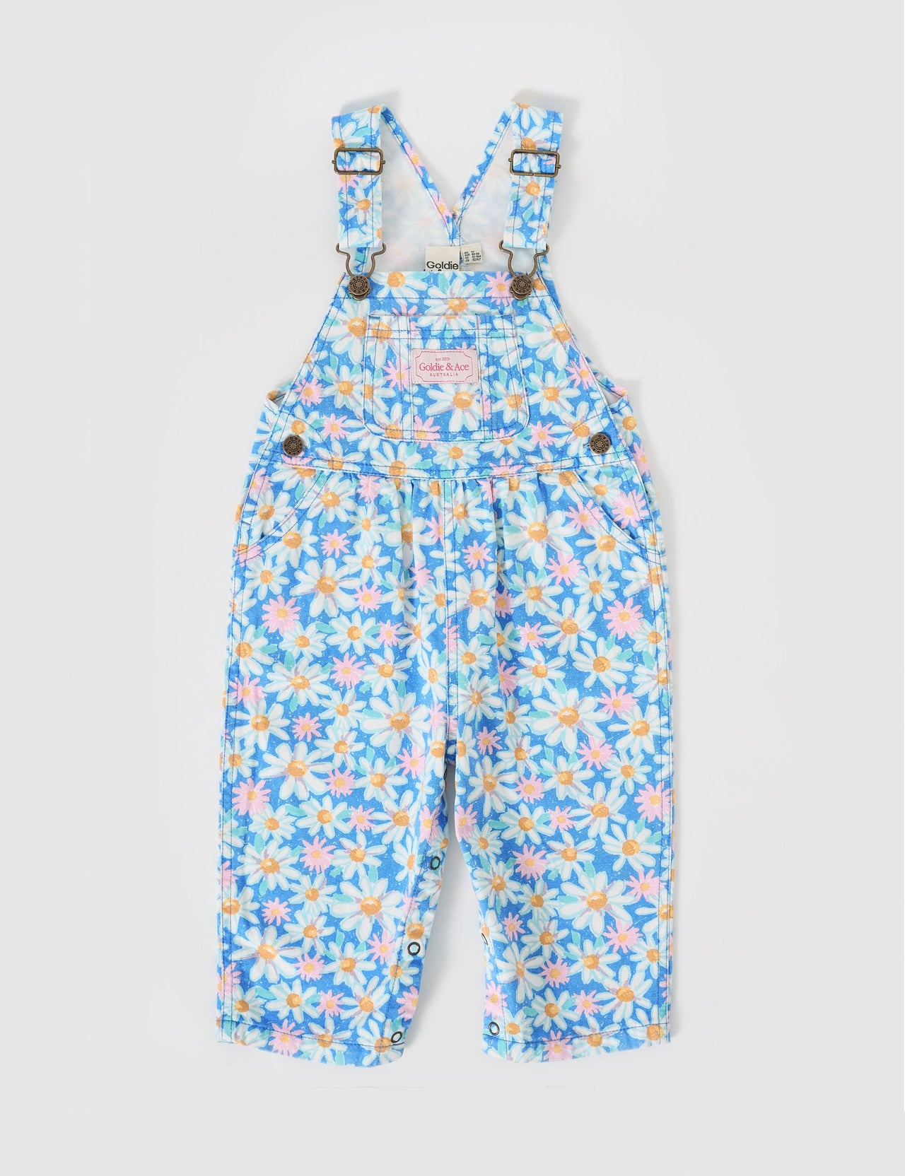 The Goldie + Ace Austin Overalls in Seaside Daisy pictured on a grey background. The material is cotton terry. It is a overall made for babies, toddlers and kids.