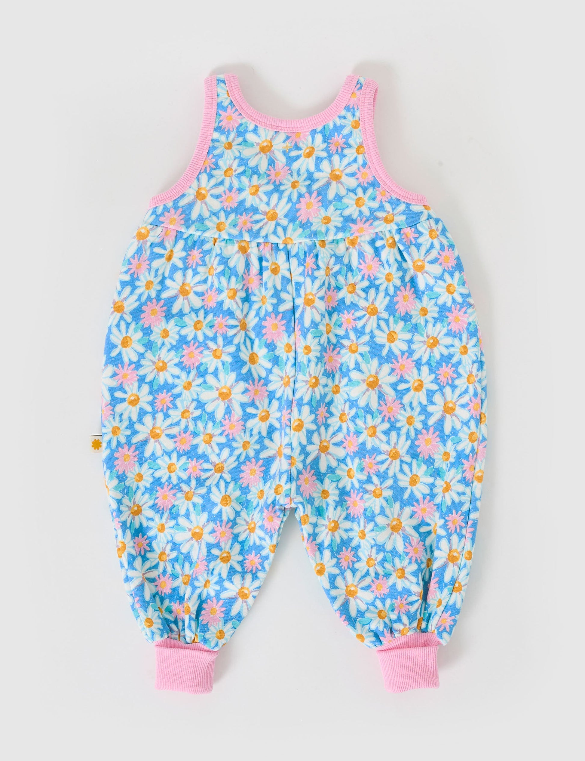 The Goldie + Ace Seaside Daisy Balloon Overall Romper in Seaside Daisy pictured on a grey background. The material is cotton terry. It is a overall made for babies, toddlers and kids.