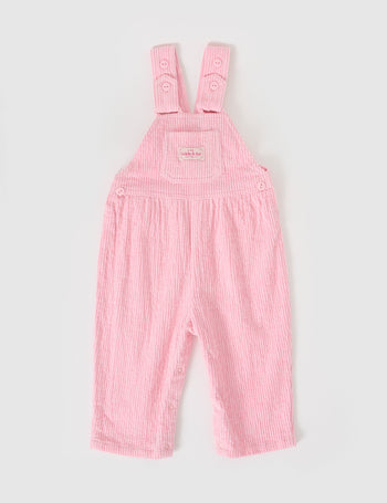 The Goldie + Ace Sammy Corduroy Overalls in Sweetpea pictured on a grey background. The material is cotton cord. It is a overall made for babies, toddlers and kids.