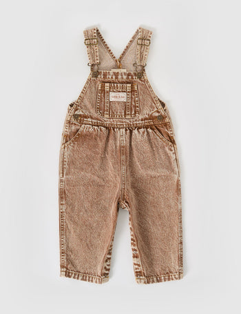 The Goldie + Ace Austin Vintage Washed Denim Overalls in Brown pictured on a grey background. The material is cotton denim. It is a overall made for babies, toddlers and kids.