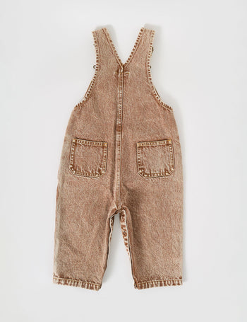 The Goldie + Ace Austin Vintage Washed Denim Overalls in Brown pictured on a grey background. The material is cotton denim. It is a overall made for babies, toddlers and kids.