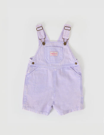 The Goldie + Ace Burton Vintage Washed Denim Overalls in Mauve pictured on a grey background. The material is cotton twill. It is a overall made for babies, toddlers and kids.