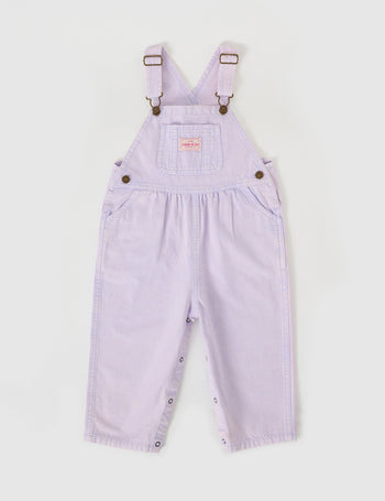 The Goldie + Ace Austin Vintage Washed Denim Overalls in Mauve pictured on a grey background. The material is cotton denim. It is a overall made for babies, toddlers and kids.