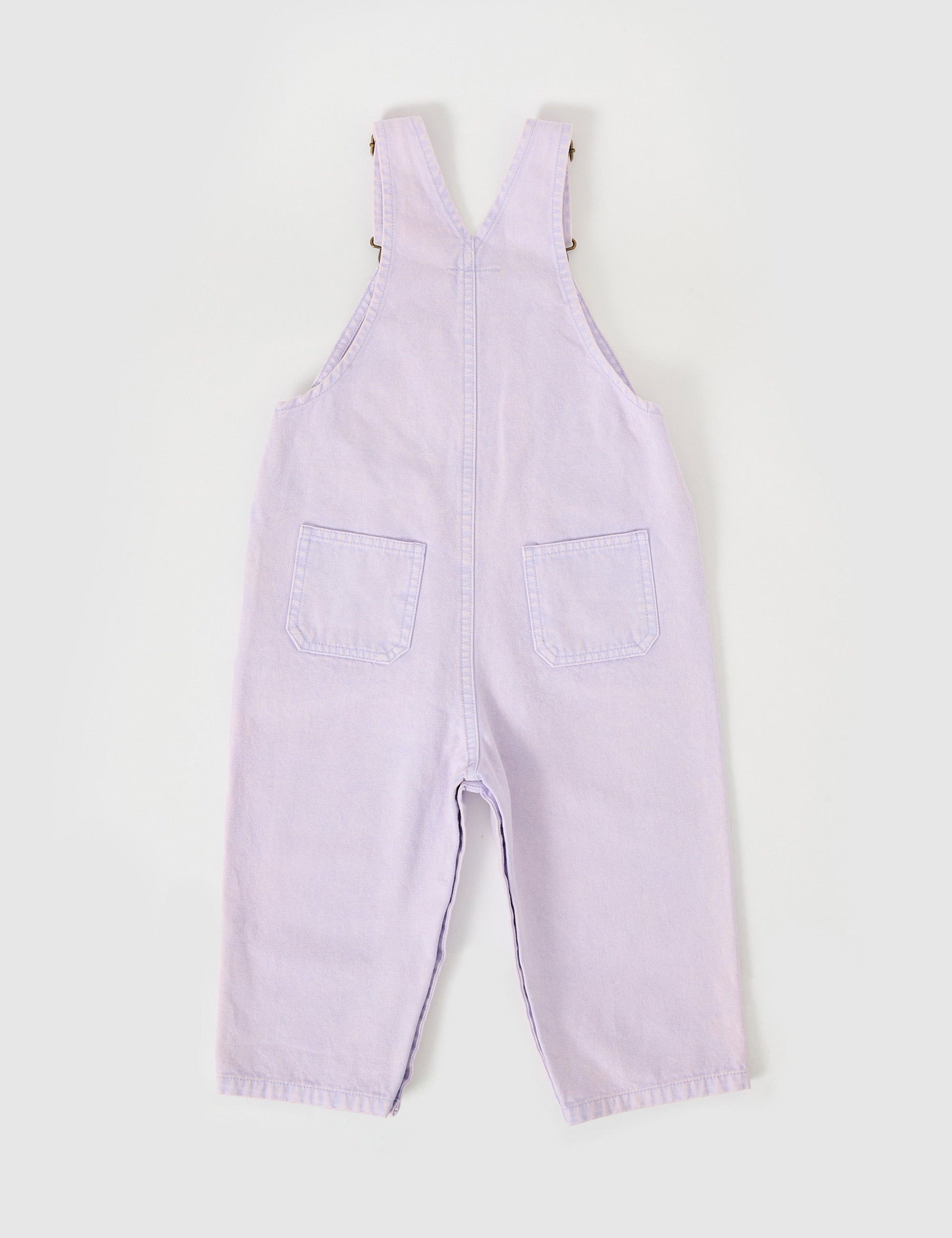 The Goldie + Ace Austin Vintage Washed Denim Overalls in Mauve pictured on a grey background. The material is cotton denim. It is a overall made for babies, toddlers and kids.