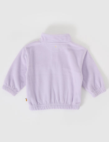 The Goldie + Ace Bobbi Polar Fleece Sweater in Lilac pictured on a grey background. The material is polyester. It is a top made for babies, toddlers and kids.