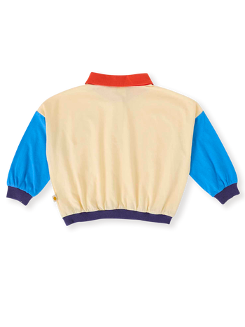 The Goldie + Ace Relaxed Rugby Sweat Top in Vanilla/Lake pictured on a transparent background. The material is 100% cotton. It is a top made for babies, toddlers and kids.