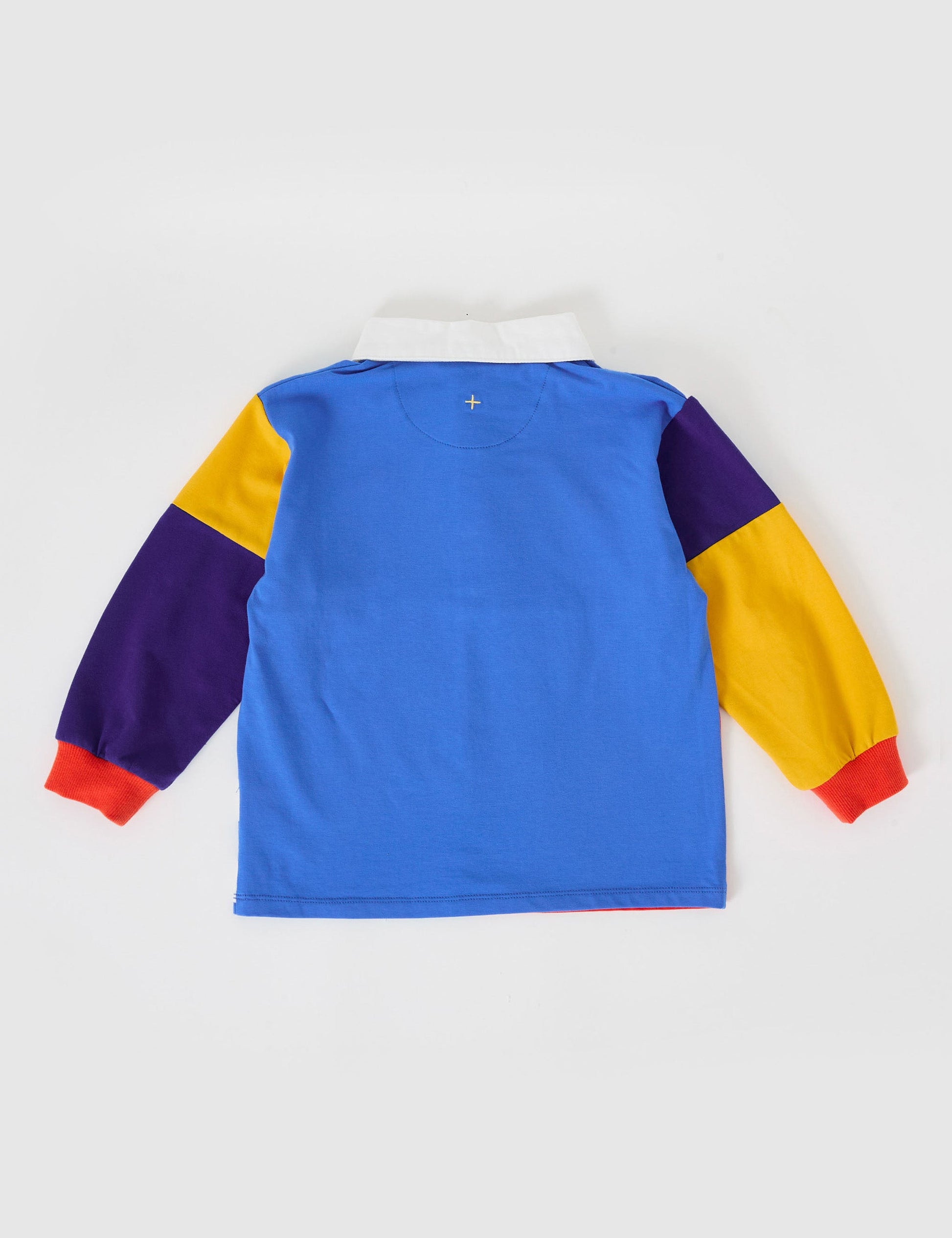 The Goldie + Ace Myles Colour Block Rugby Polo in Primary Multi pictured on a grey background. The material is cotton jersey. It is a top made for babies, toddlers and kids.