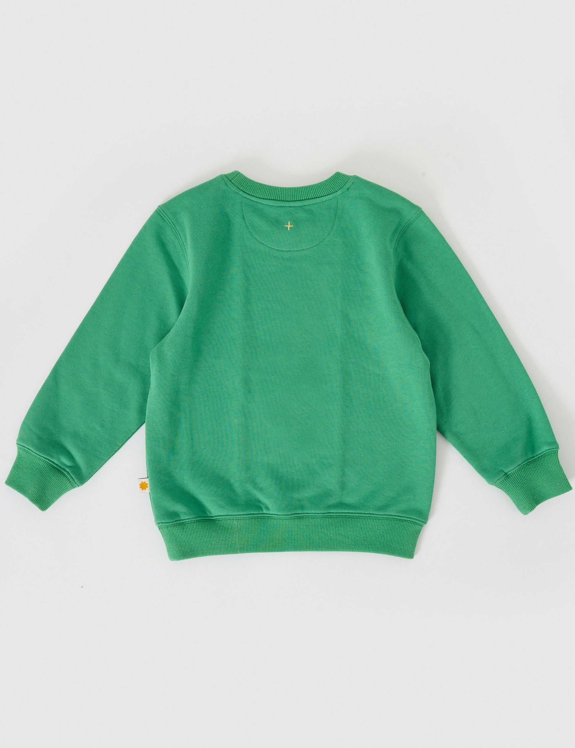 The Goldie + Ace Goldie Sports Day Terry Sweater in Green pictured on a grey background. The material is cotton terry. It is a top made for babies, toddlers and kids.