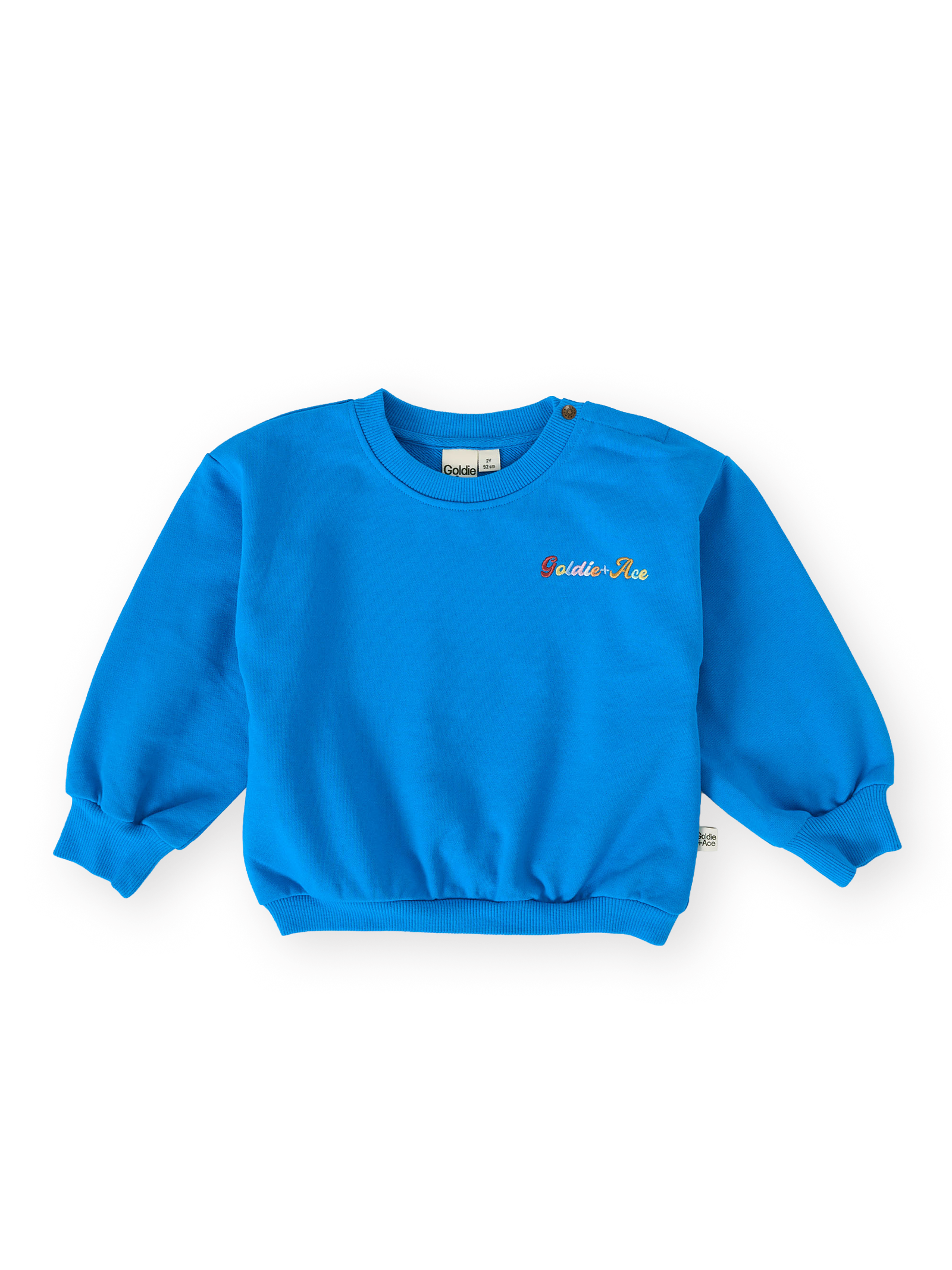 The Goldie + Ace Ellis Terry Sweater in Electric Blue pictured on a transparent background. The material is 100% cotton. It is a sweater made for babies, toddlers and kids.