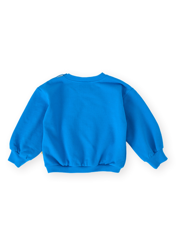 The Goldie + Ace Ellis Terry Sweater in Electric Blue pictured on a transparent background. The material is 100% cotton. It is a sweater made for babies, toddlers and kids.