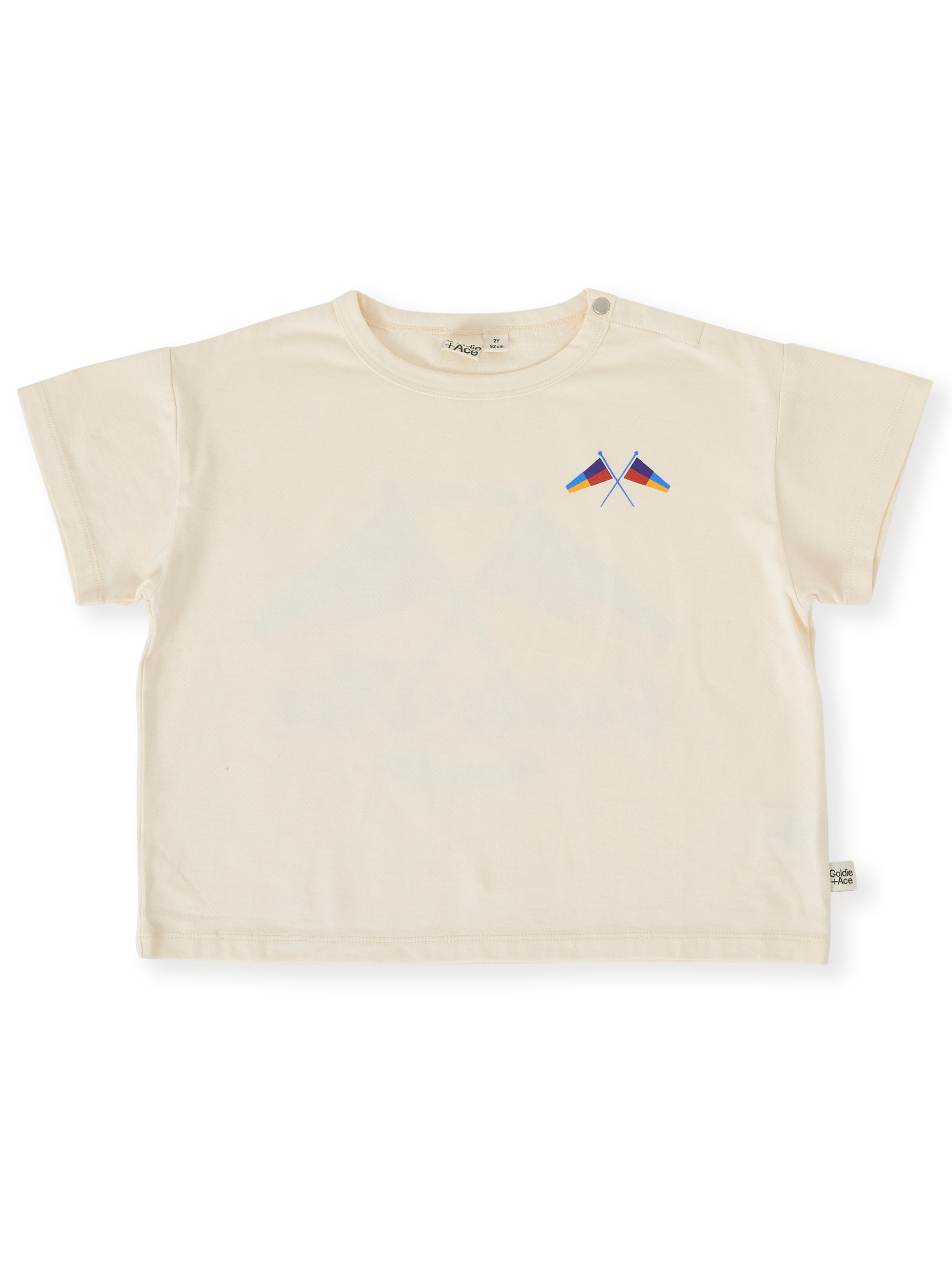 The Goldie + Ace Nautical Flag Oversized T-Shirt in Cream pictured on a transparent background. The material is 100% cotton. It is a top made for babies, toddlers and kids.