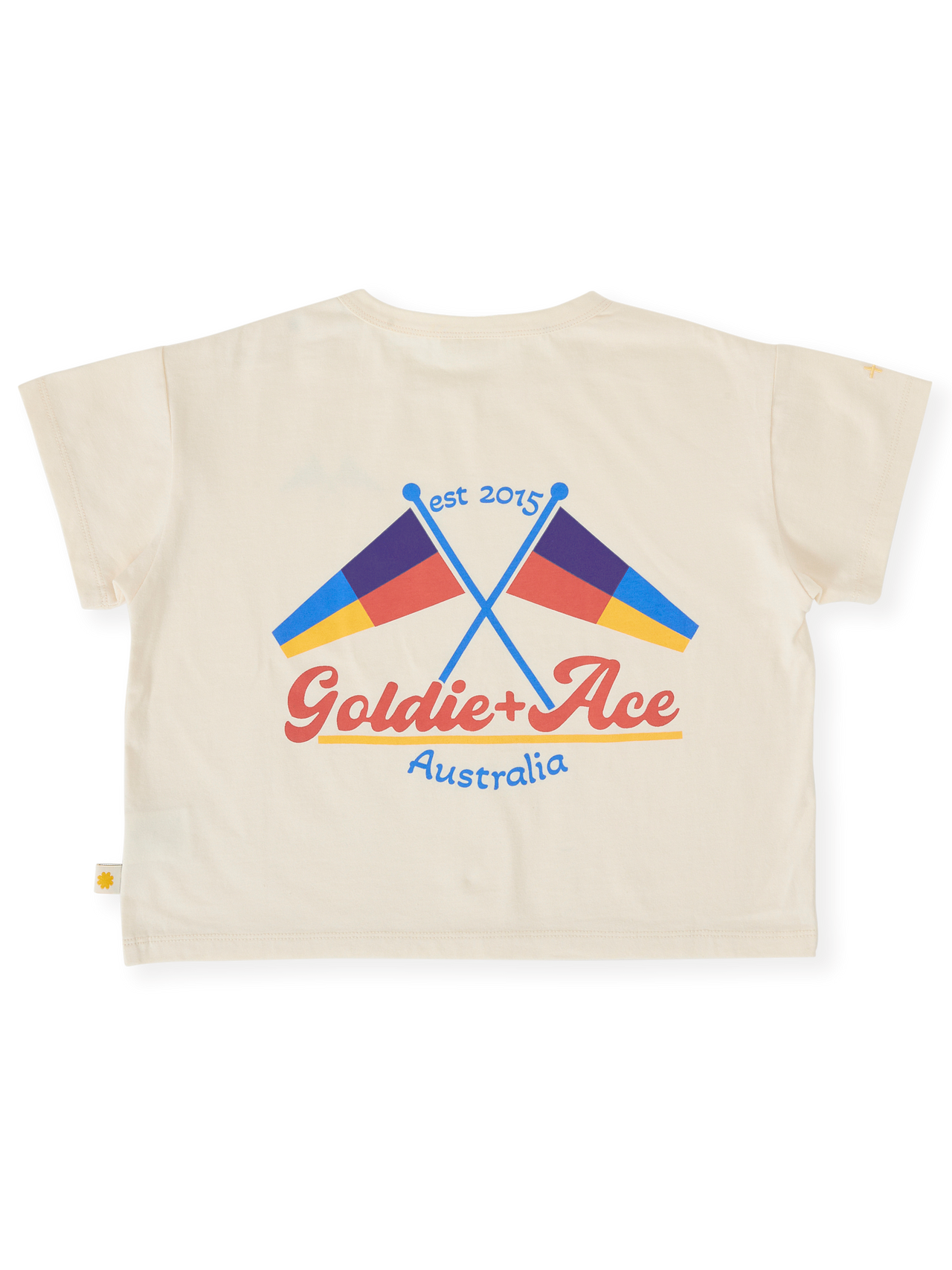 The Goldie + Ace Nautical Flag Oversized T-Shirt in Cream pictured on a transparent background. The material is 100% cotton. It is a top made for babies, toddlers and kids.