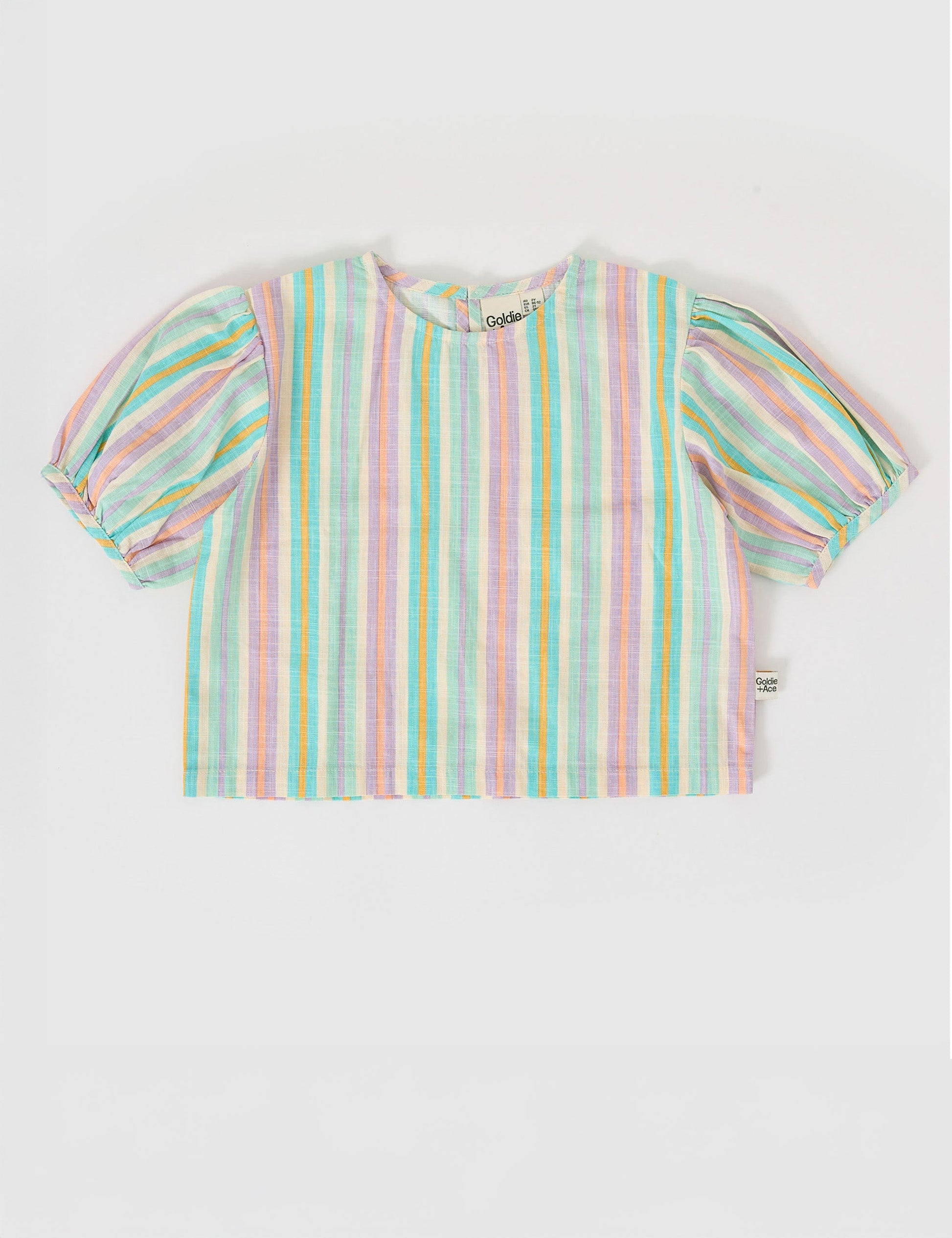 The Goldie + Ace Puff Sleeve Linen Top in Resort Stripe pictured on a grey background. The material is linen. It is a top made for babies, toddlers and kids.