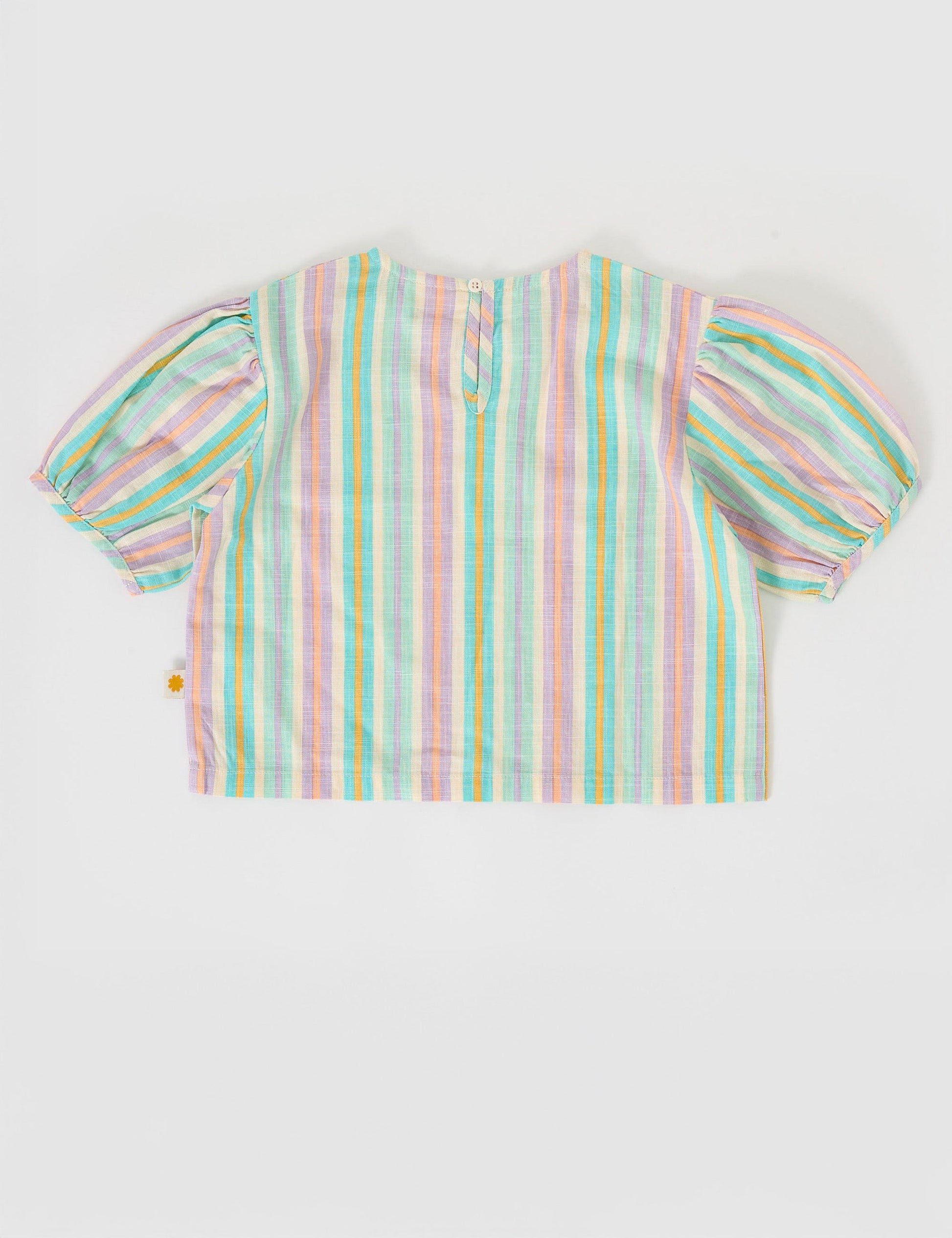 The Goldie + Ace Puff Sleeve Linen Top in Resort Stripe pictured on a grey background. The material is linen. It is a top made for babies, toddlers and kids.