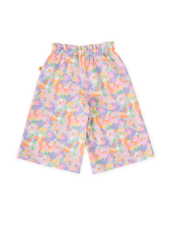 The Goldie + Ace Pastel Bouquet Arlo Wide Leg Pant in Lilac Multi pictured on a transparent background. The material is 100% cotton. It is a bottom made for babies, toddlers and kids.
