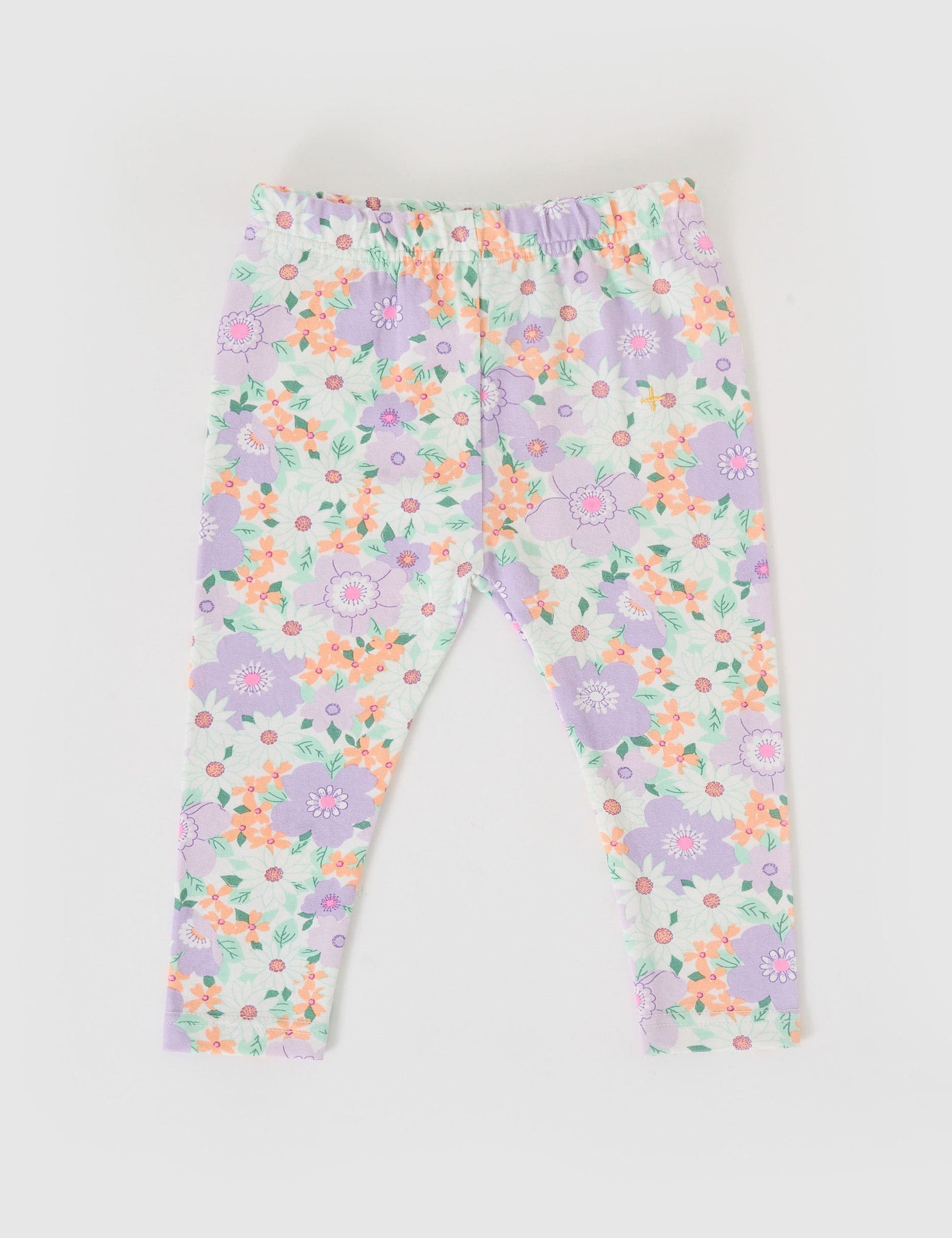 The Goldie + Ace Flora Leggings in Lilac Multi pictured on a grey background. The material is soft cotton elastane. It is a bottom made for babies, toddlers and kids.