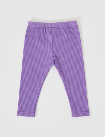 The Goldie + Ace Bowie Rib Legging in Grape pictured on a grey background. The material is soft cotton elastane. It is a bottom made for babies, toddlers and kids.