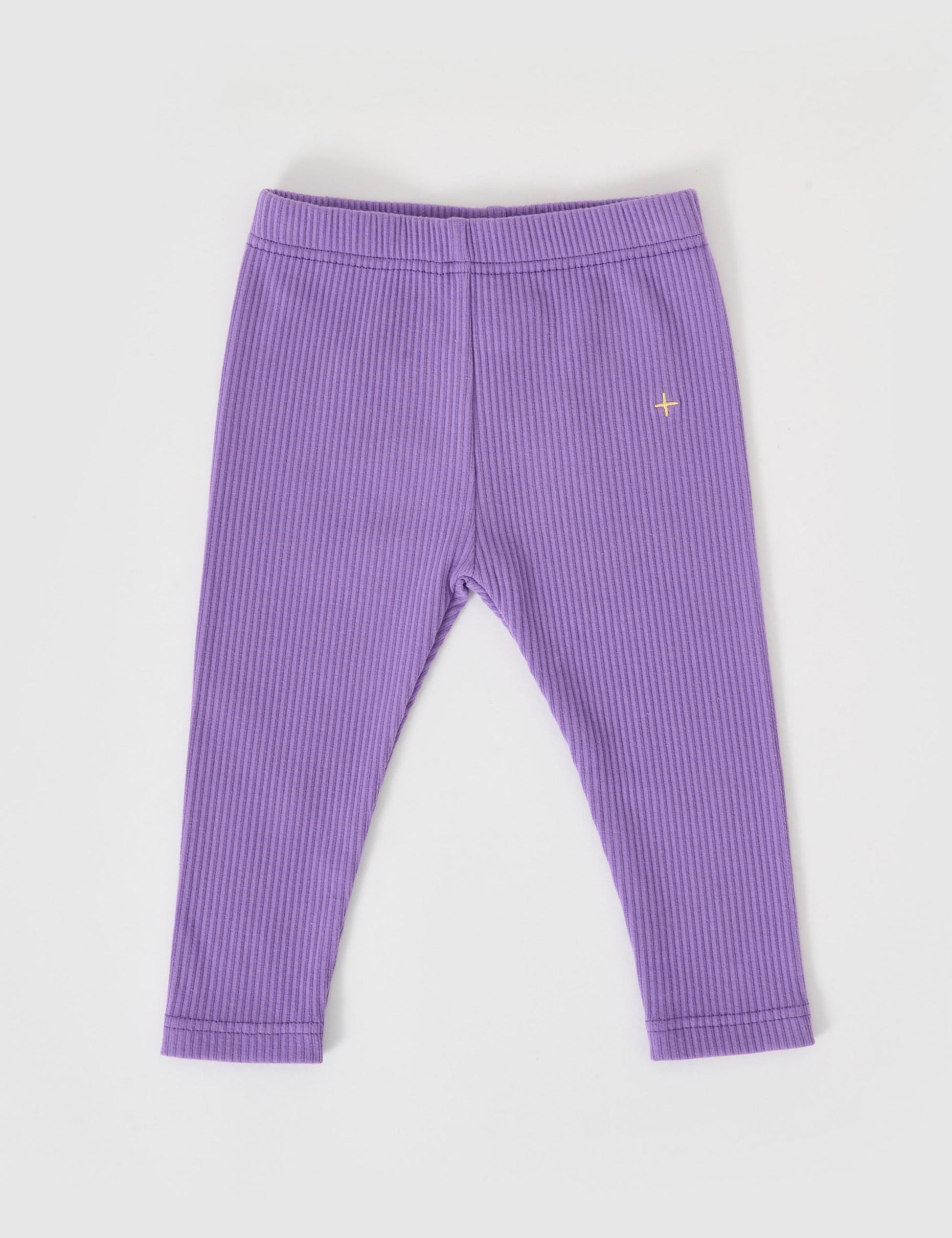 The Goldie + Ace Bowie Rib Legging in Grape pictured on a grey background. The material is soft cotton elastane. It is a bottom made for babies, toddlers and kids.