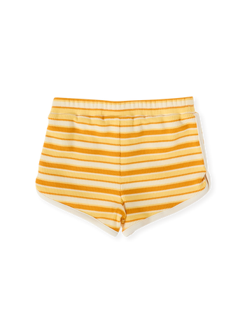 The Goldie + Ace Sunshine Stripe Shorts in Lemon/Golden pictured on a transparent background. The material is 100% cotton. It is a bottom made for babies, toddlers and kids.