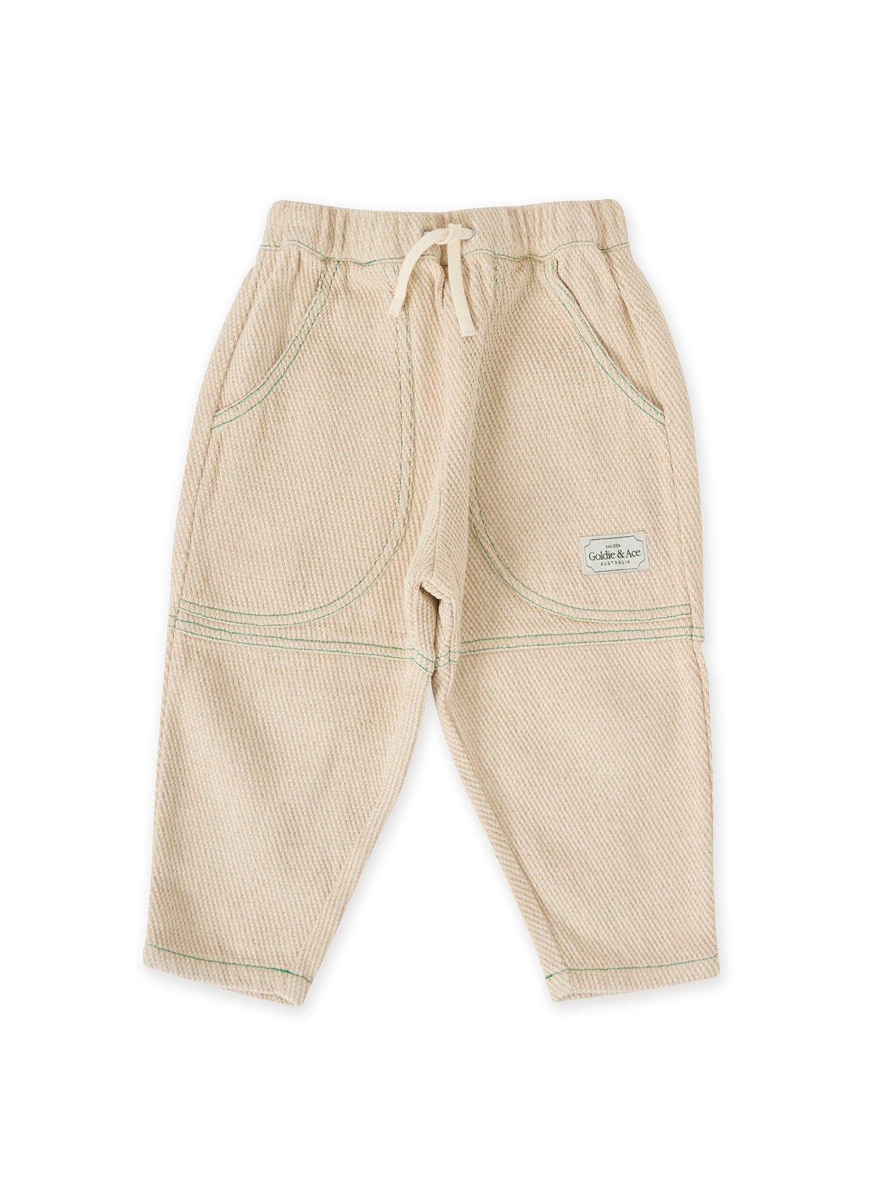 The Goldie + Ace Drew Embroidered Pocket Pant in Sand pictured on a transparent background. The material is durable & soft cotton-linen blend. It is a bottom made for babies, toddlers and kids.