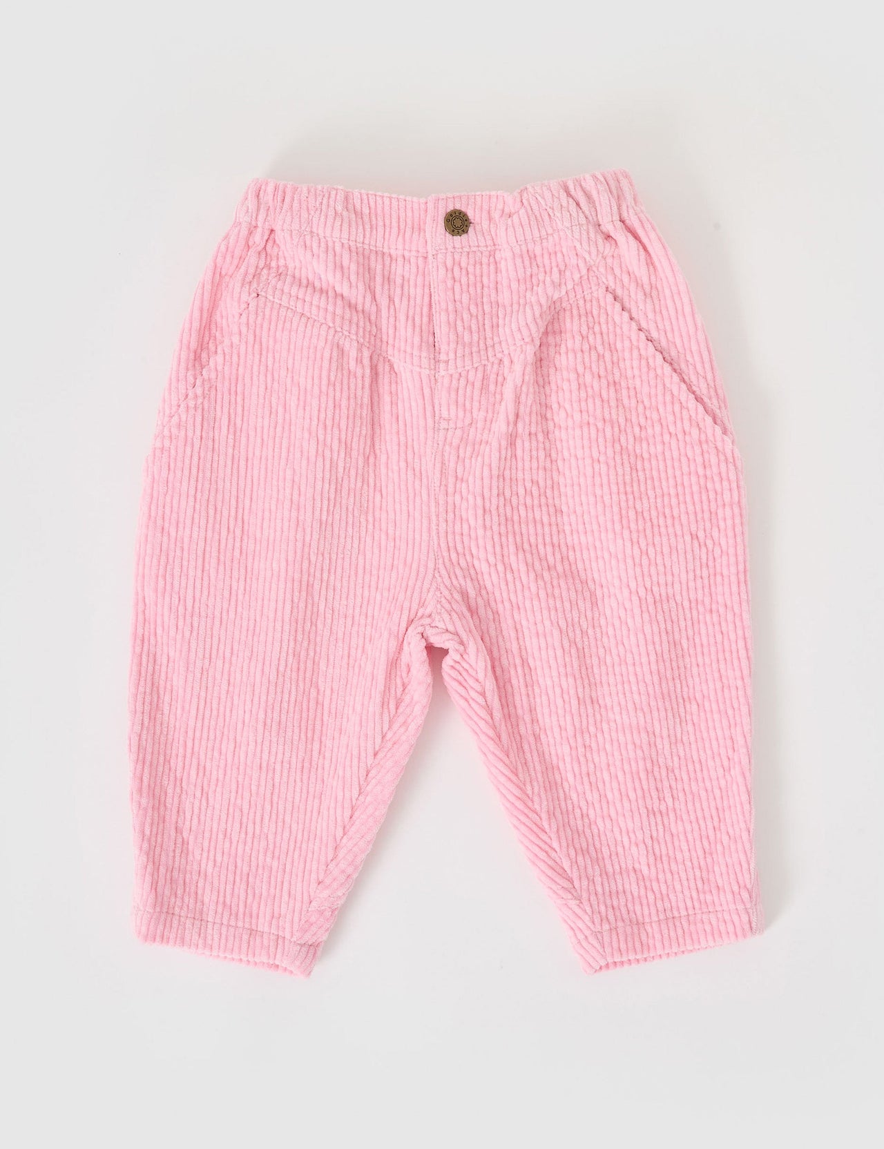 The Goldie + Ace Nora Corduroy Pant in Sweetpea pictured on a grey background. The material is cotton cord. It is a bottom made for babies, toddlers and kids.