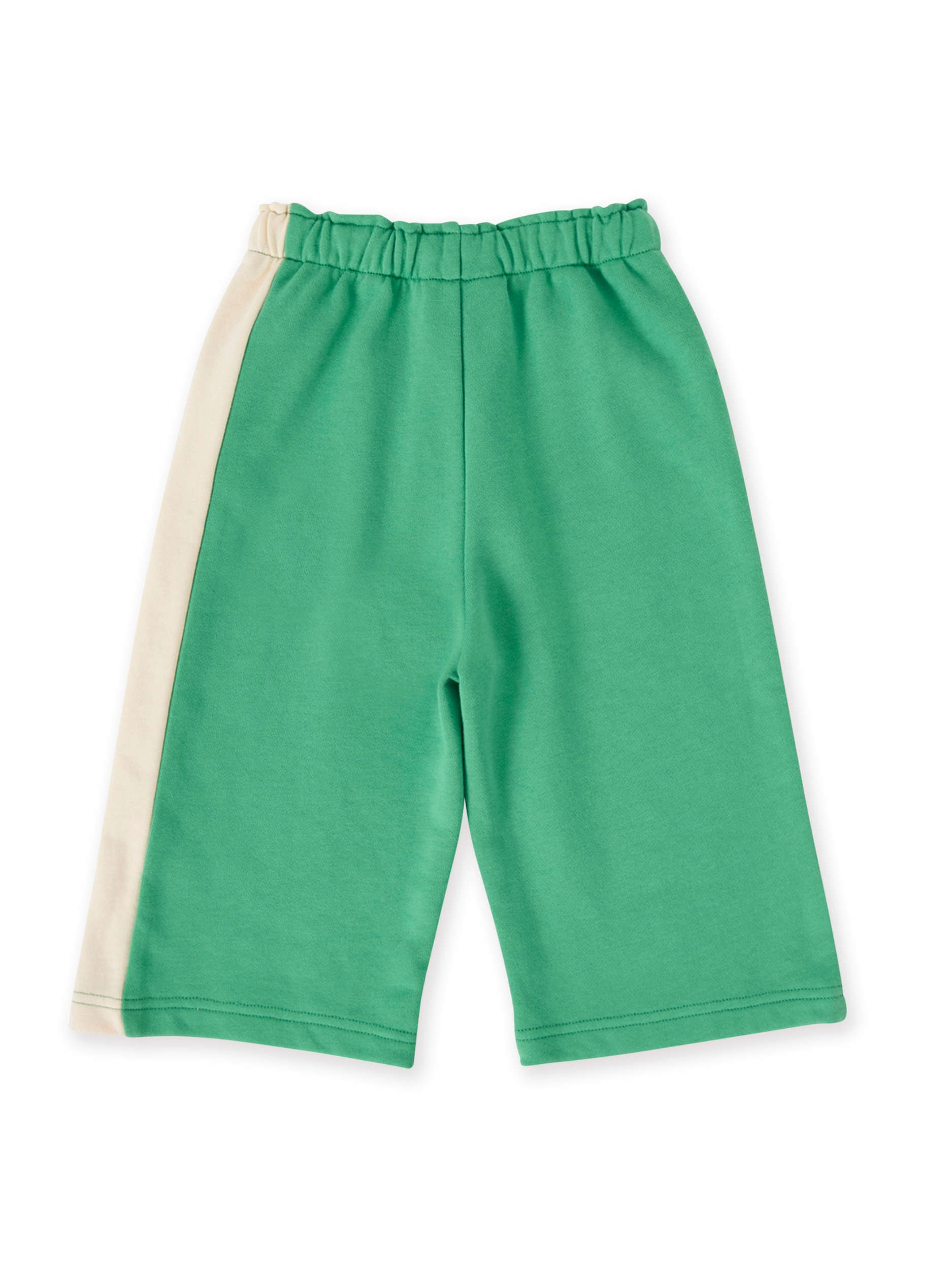 The Goldie + Ace Arlo Wide Leg Pant in Fern/Vanilla pictured on a transparent background. The material is 100% cotton. It is a bottom made for babies, toddlers and kids.