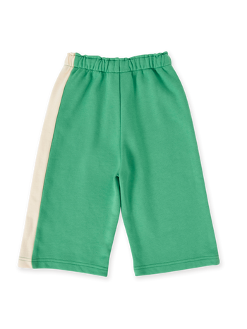 The Goldie + Ace Arlo Wide Leg Pant in Fern/Vanilla pictured on a transparent background. The material is 100% cotton. It is a bottom made for babies, toddlers and kids.
