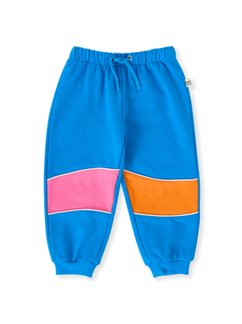 The Goldie + Ace Rudy Piped Panel Sweatpants in Sunrise pictured on a transparent background. The material is 100% cotton. It is a bottom made for babies, toddlers and kids.