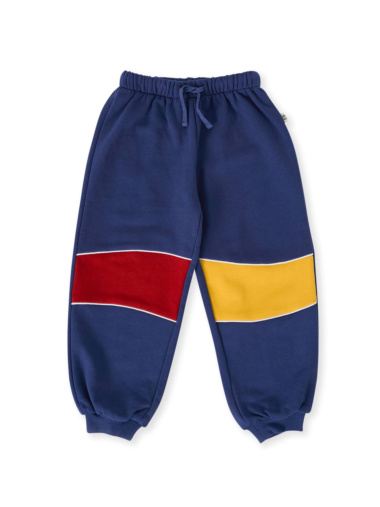 The Goldie + Ace Rudy Piped Panel Sweatpants in Outback pictured on a transparent background. The material is 100% cotton. It is a bottom made for babies, toddlers and kids.