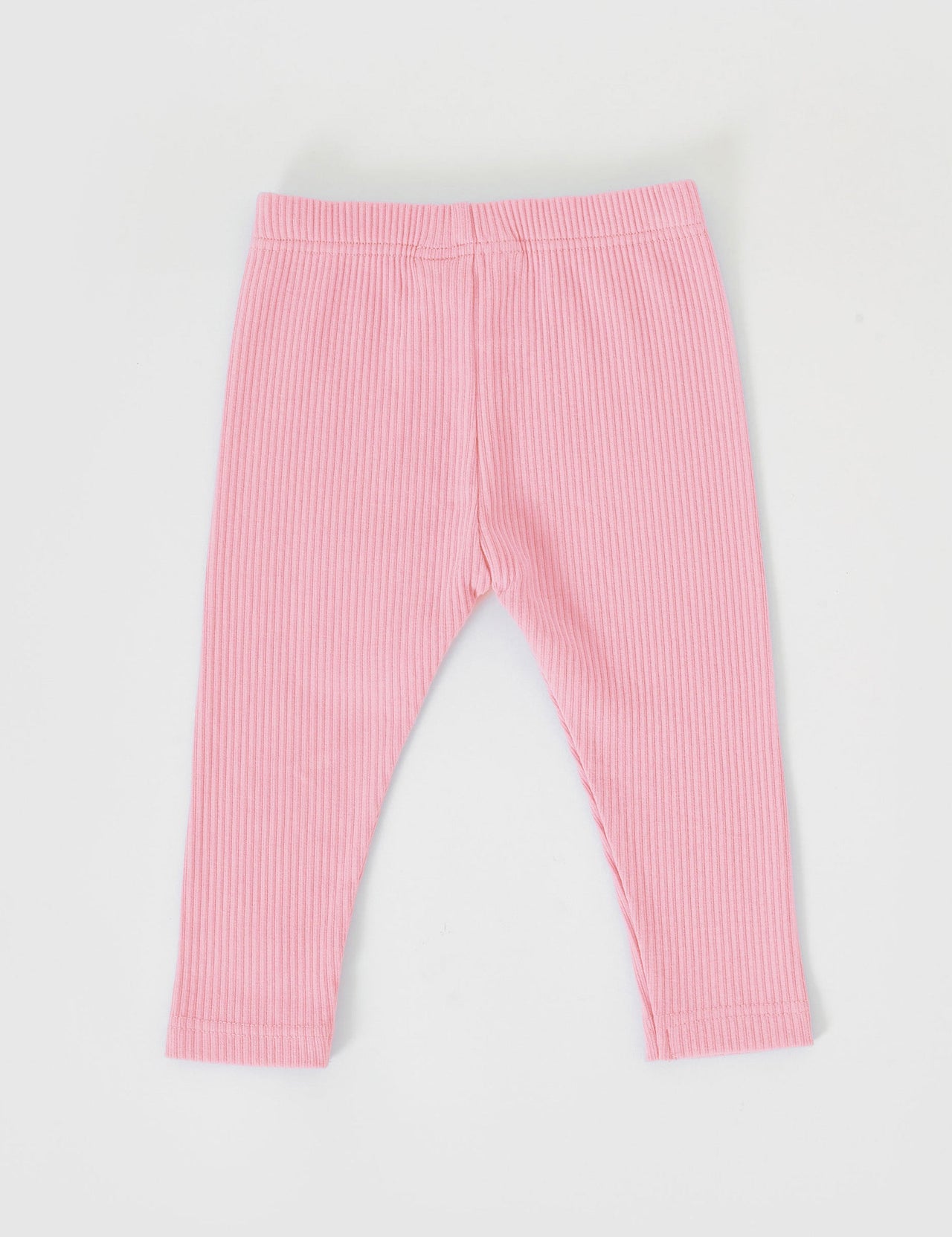 The Goldie + Ace Bowie Rib Legging in Sweetpea pictured on a grey background. The material is soft cotton elastane. It is a bottom made for babies, toddlers and kids.