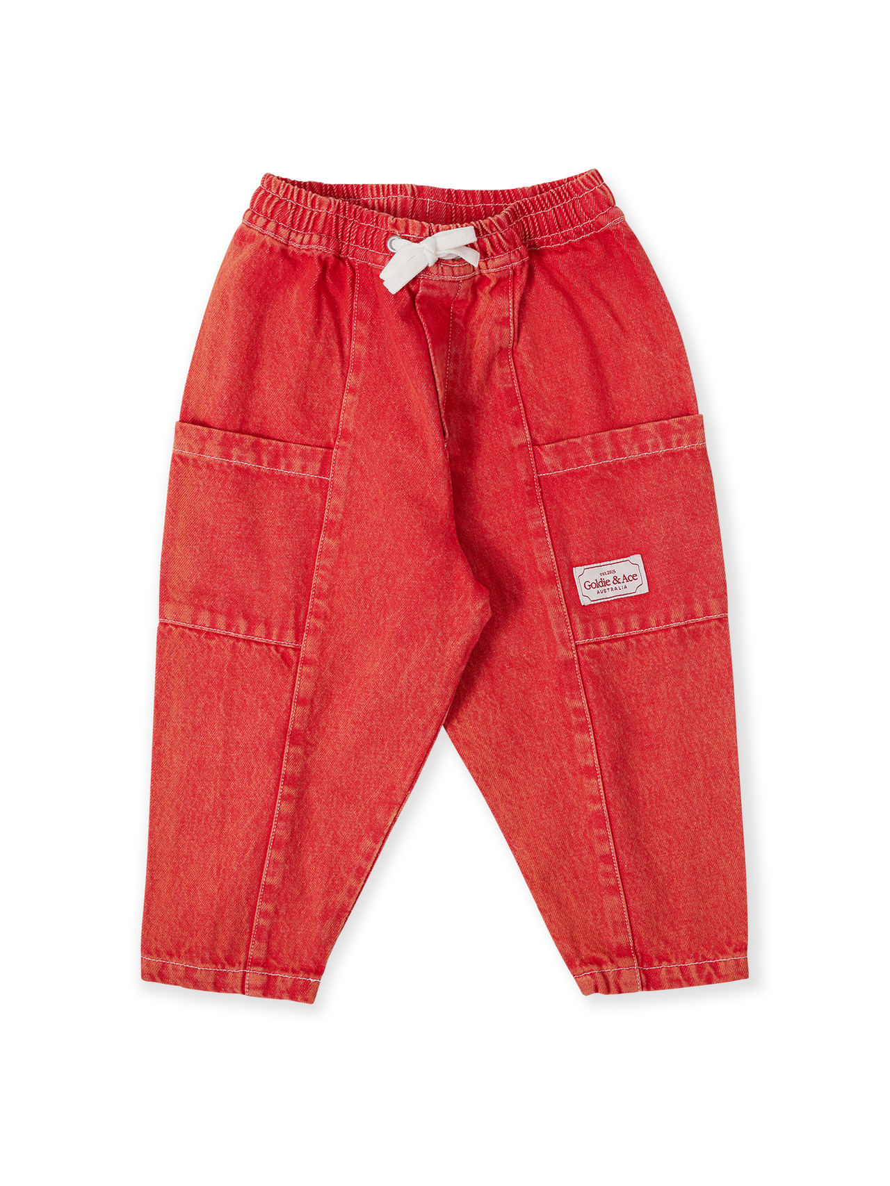 The Goldie + Ace Kit Denim Pocket Pant in Apple Red pictured on a transparent background. The material is 100% cotton. It is a bottom made for babies, toddlers and kids.
