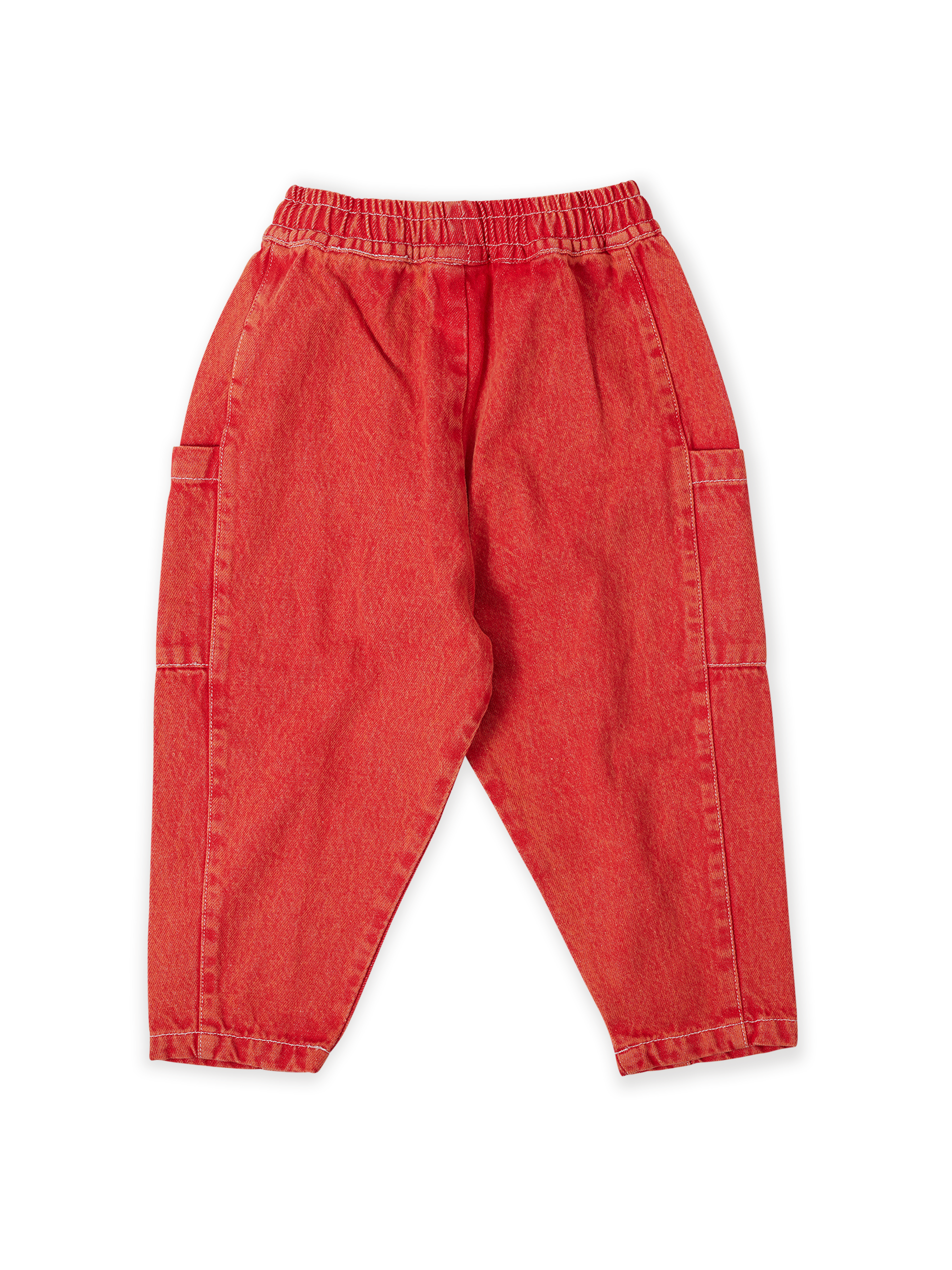 The Goldie + Ace Kit Denim Pocket Pant in Apple Red pictured on a transparent background. The material is 100% cotton. It is a bottom made for babies, toddlers and kids.