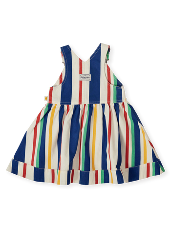 The Goldie + Ace 90's Bold Stripe Heidi Denim Pinafore Dress in Primary pictured on a transparent background. The material is 100% cotton. It is a dress made for babies, toddlers and kids.