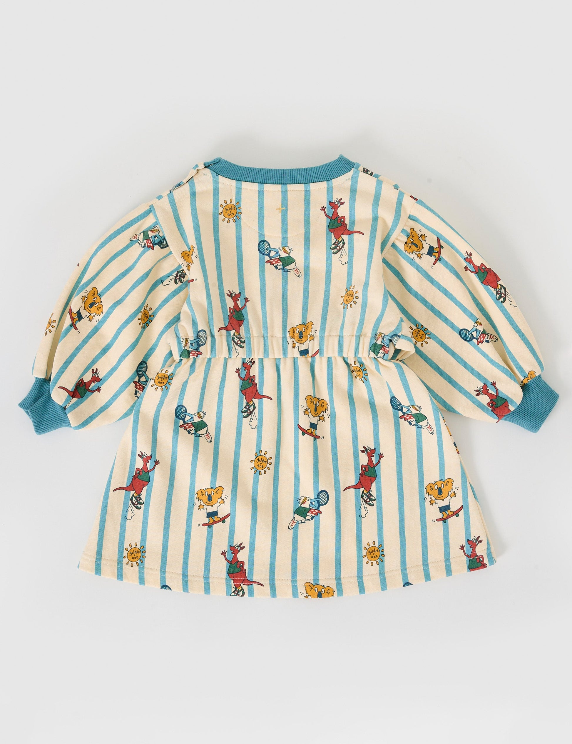 The Goldie + Ace Goldie Squad Leah Long Sleeve Dress in Vanilla/Dusty Blue pictured on a grey background. The material is cotton terry. It is a dress made for babies, toddlers and kids.