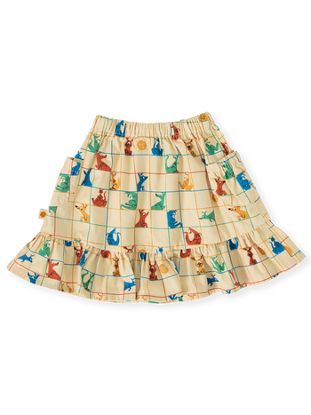 The Goldie + Ace Hopscotch Maya Pocket Skirt in Vanilla/Primary pictured on a transparent background. The material is 100% cotton. It is a bottom made for babies, toddlers and kids.