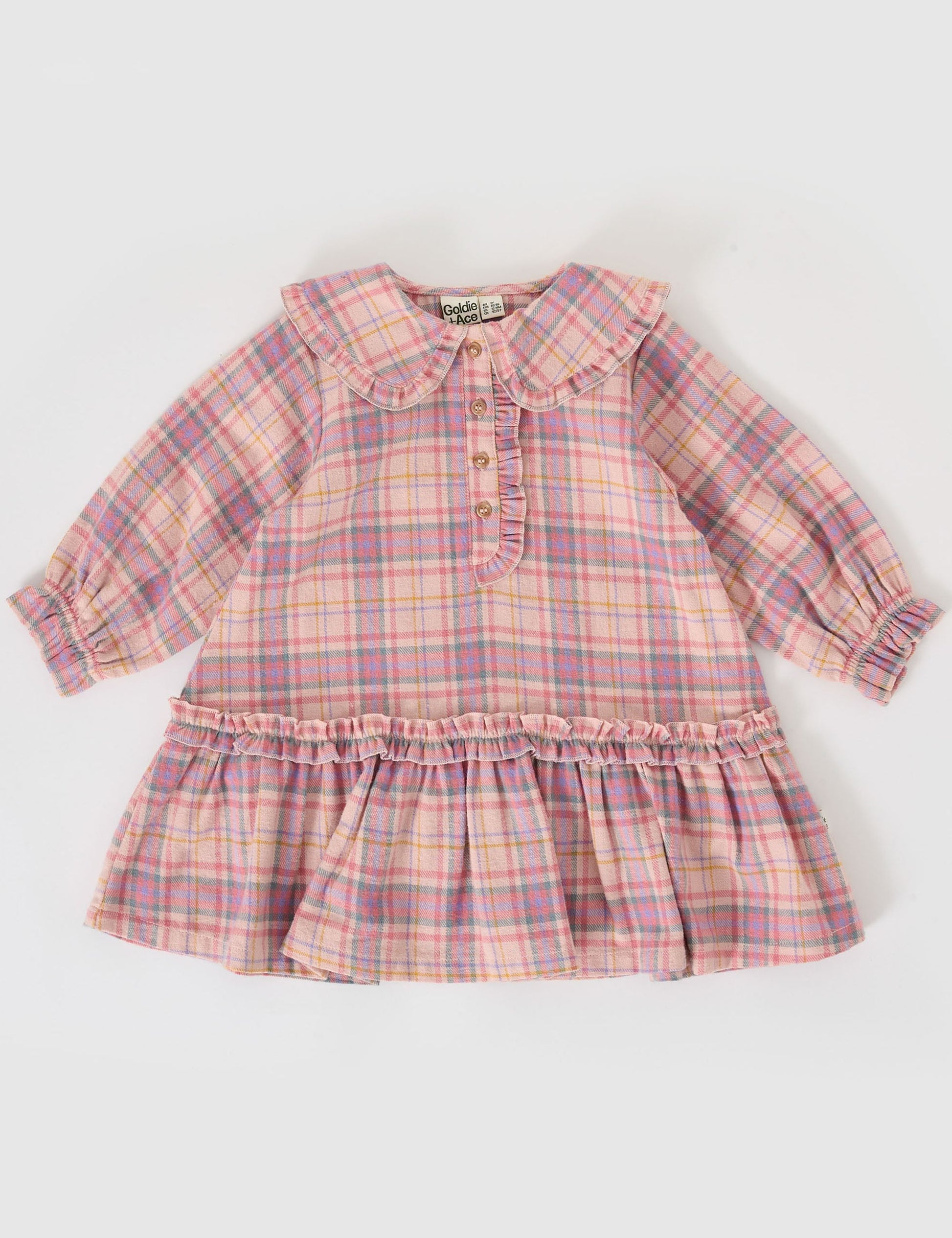 The Goldie + Ace Diana Collared Check Dress in Pink Multi pictured on a grey background. The material is cotton. It is a dress made for babies, toddlers and kids.