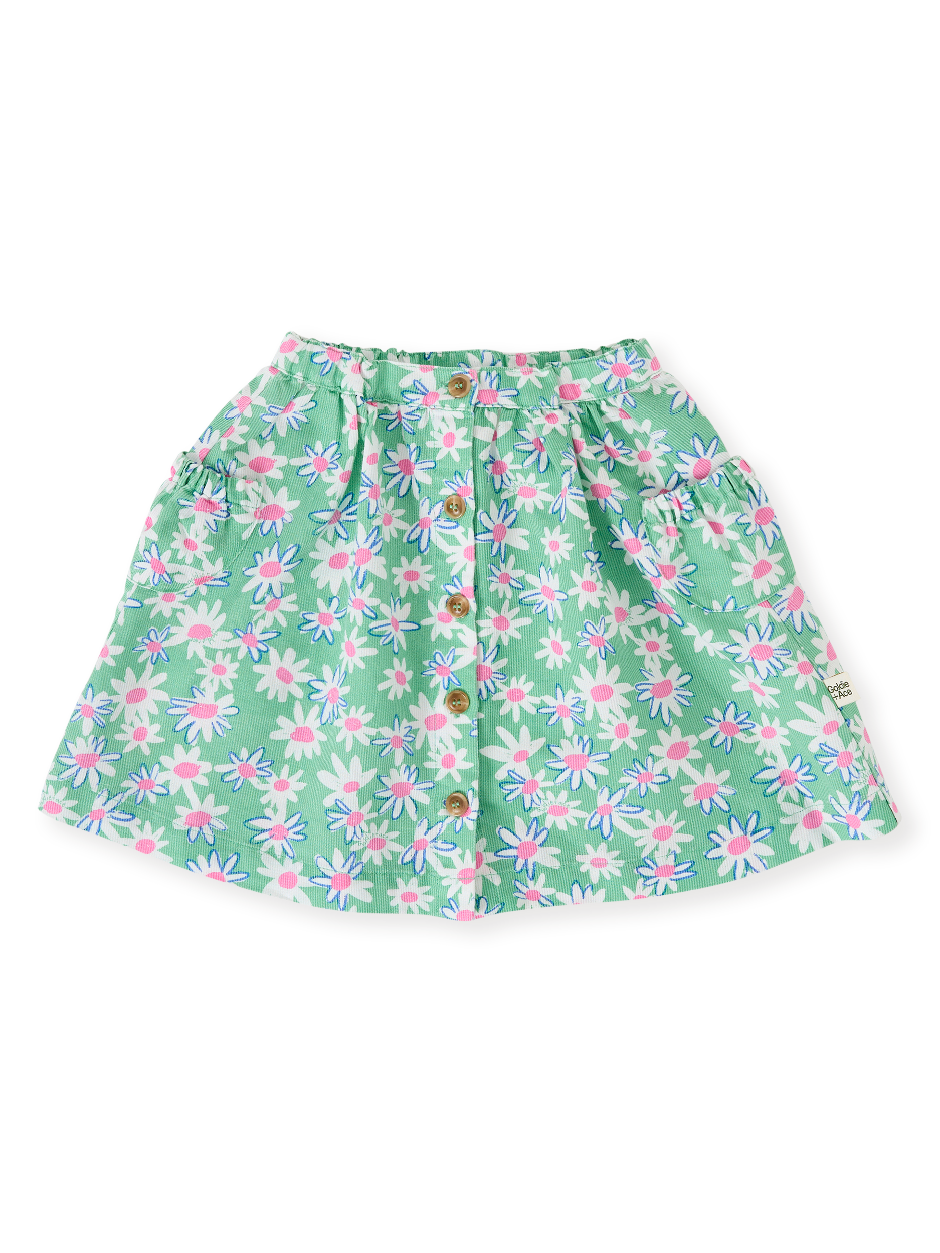 The Goldie + Ace Daisy Patch Presley Pocket Skirt in Moss pictured on a transparent background. The material is breathable cotton-linen blend. It is a bottom made for babies, toddlers and kids.