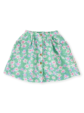 The Goldie + Ace Daisy Patch Presley Pocket Skirt in Moss pictured on a transparent background. The material is breathable cotton-linen blend. It is a bottom made for babies, toddlers and kids.