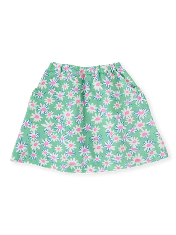 The Goldie + Ace Daisy Patch Presley Pocket Skirt in Moss pictured on a transparent background. The material is breathable cotton-linen blend. It is a bottom made for babies, toddlers and kids.