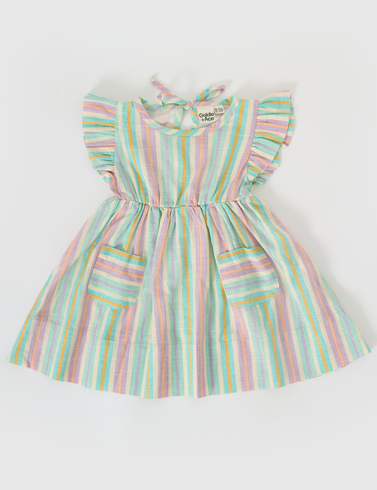 The Goldie + Ace Lyla Linen Dress in Resort Stripe pictured on a grey background. The material is linen. It is a dress made for babies, toddlers and kids.