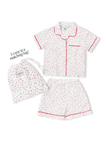 Children's pyjama set with cherry print on seersucker cotton, and a matching drawstring bag