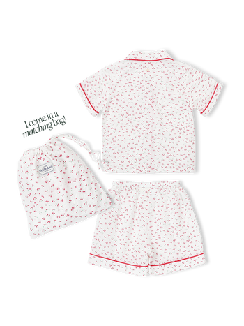 Children's pyjama set with cherry print on seersucker cotton, and a matching drawstring bag