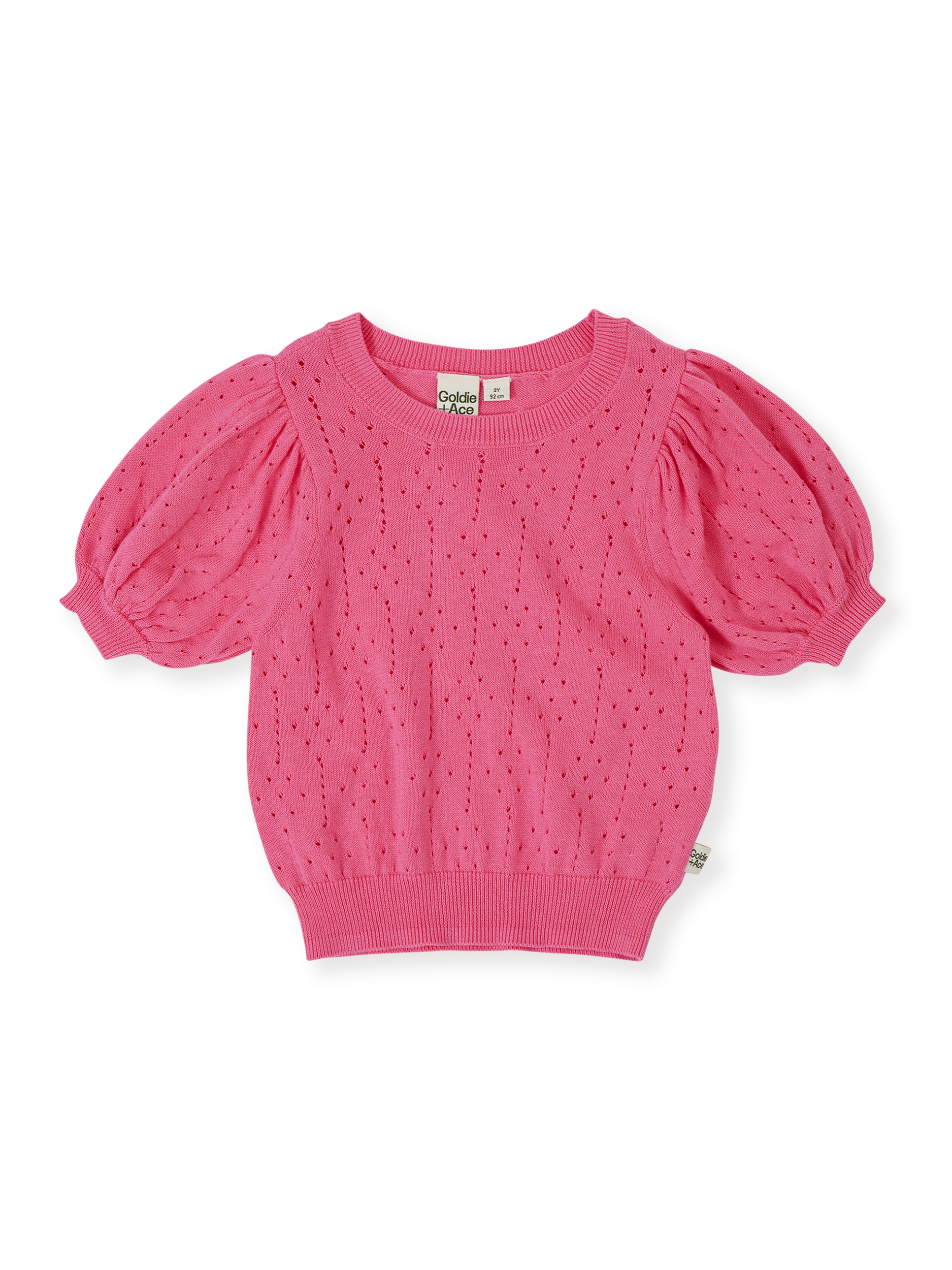 The Goldie + Ace Pointelle Puff Knit Top in Pink Lemonade pictured on a transparent background. The material is 100% cotton. It is a knit made for babies, toddlers and kids.