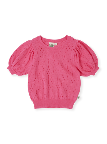 The Goldie + Ace Pointelle Puff Knit Top in Pink Lemonade pictured on a transparent background. The material is 100% cotton. It is a knit made for babies, toddlers and kids.