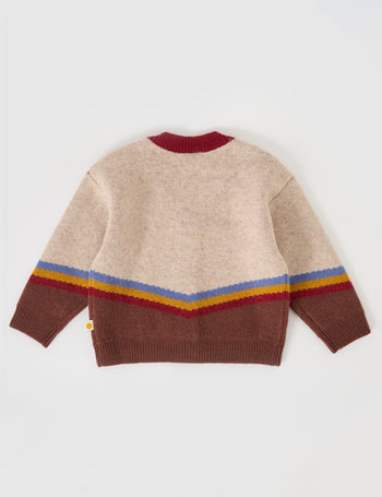 The Goldie + Ace Varsity Knit Cardigan in Vanilla/Brown pictured on a grey background. The material is super soft wool blend. It is a knit made for babies, toddlers and kids.