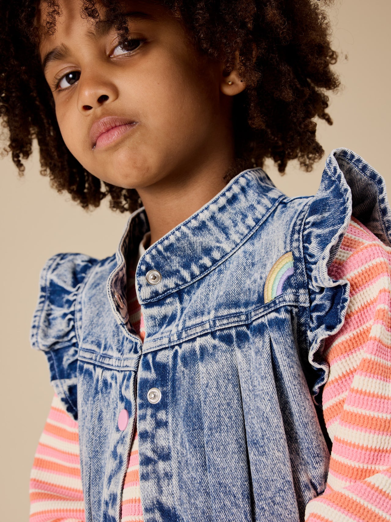 The Goldie + Ace Watermelon Stripe Long Sleeve Top in Pink/Peach pictured on a transparent background. The material is 100% cotton. It is a top made for babies, toddlers and kids.