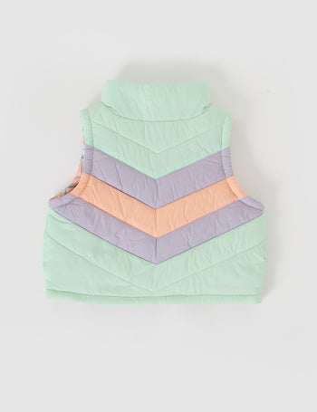 The Goldie + Ace Panelled Vest in Mint pictured on a grey background. The material is poly with poly filling. It is a top made for babies, toddlers and kids.