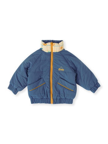 The Goldie + Ace Hopscotch Reversible Puffer Jacket in Lake/Vanilla pictured on a transparent background. The material is poly with cotton lining. It is a jacket made for babies, toddlers and kids.