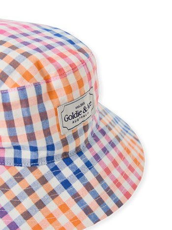 The Goldie + Ace Rainbow Gingham Bucket Hat in Multi pictured on a transparent background. The material is cotton with cotton lining. It is a accessory made for babies, toddlers and kids.